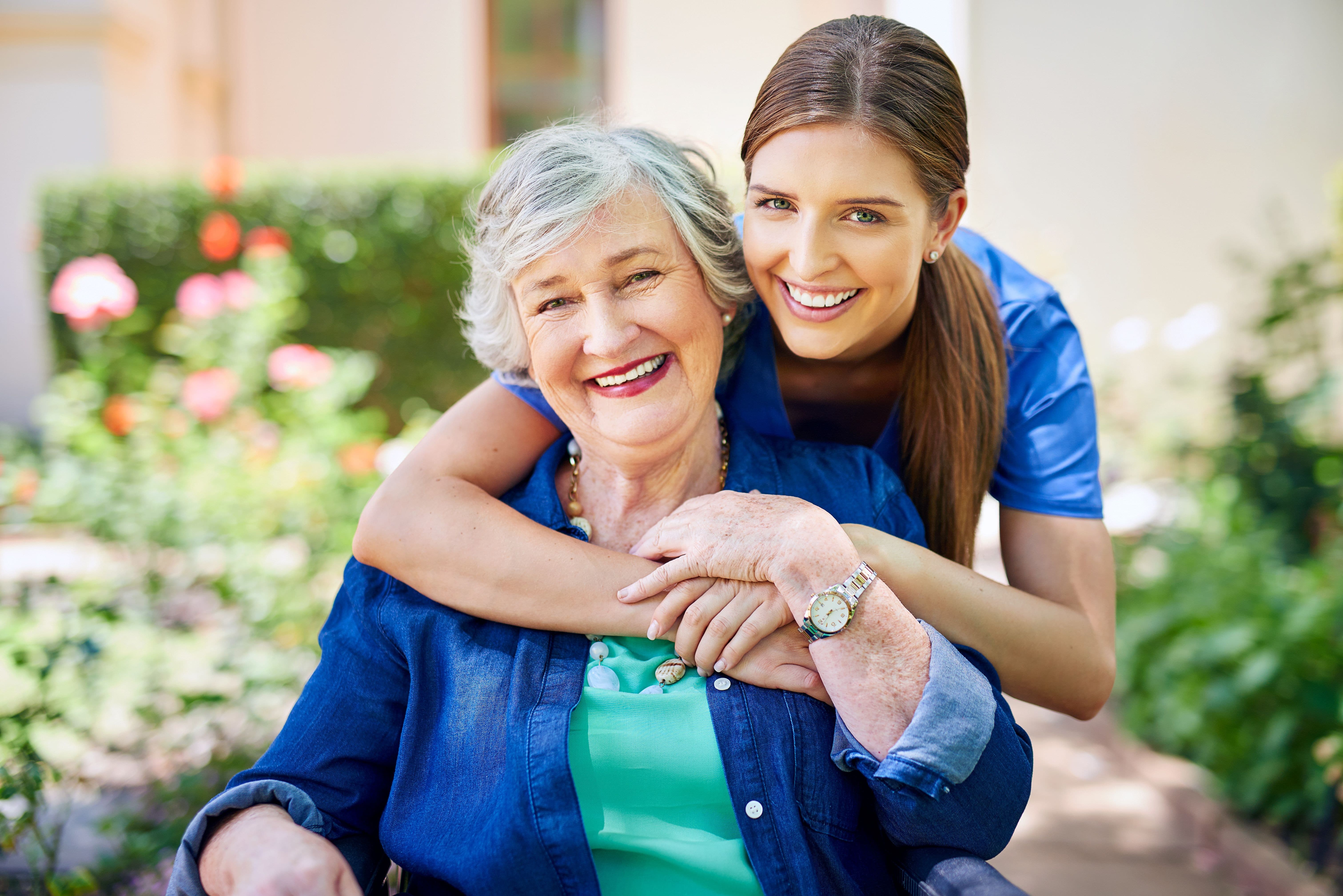Nurse poses with older woman Nurse poses with older woman.